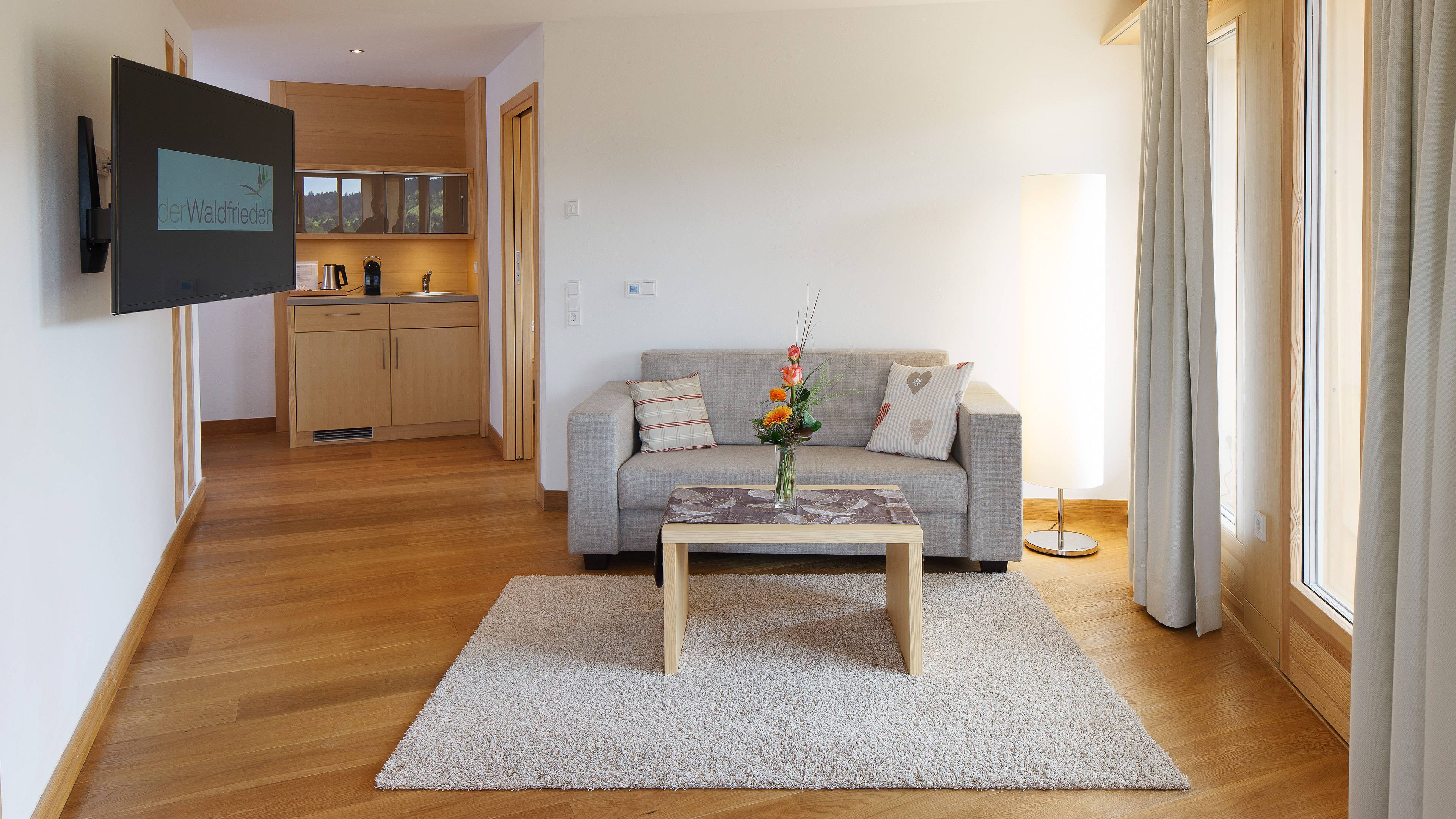 Wohnbereich Hotelzimmer Suite Panorama der Waldfrieden